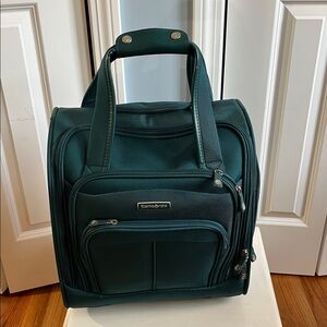 Samsonite rolling Teal under the seat carry-on pockets 16X14”